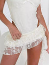 Milky-white ruffled floral-lace mini skirt