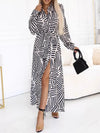 Zebra-print belted long-sleeve maxi shirt dress with front slit.