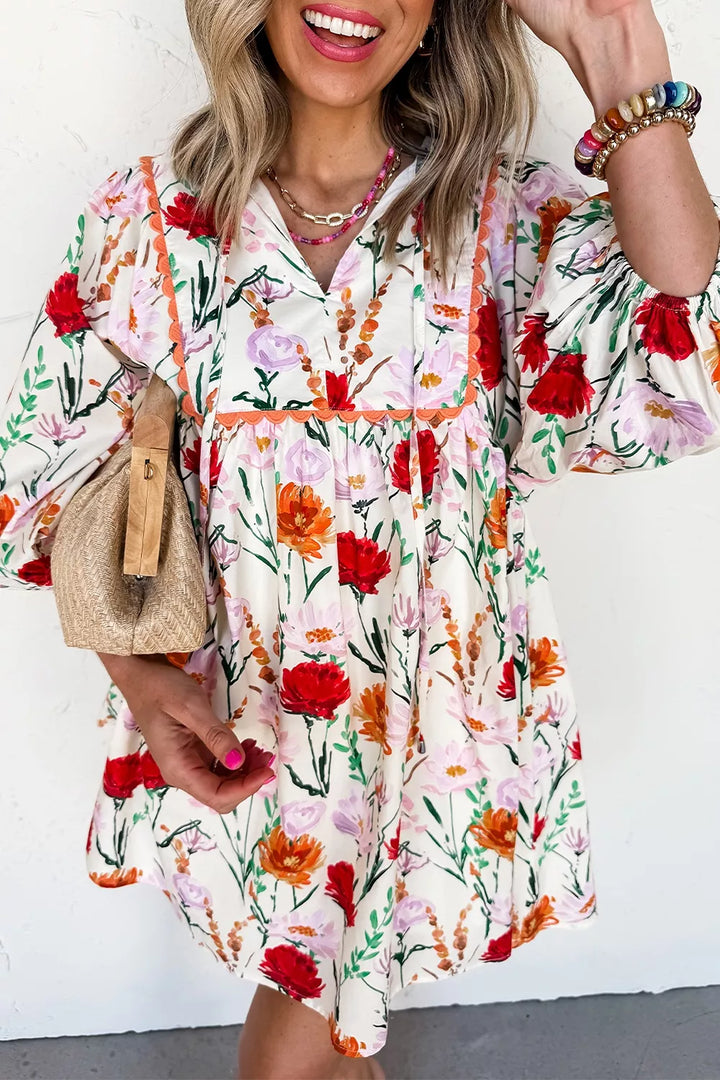 Floral ricrac-trim puff-sleeve mini dress with tie detail.
