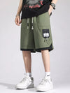 Men's green drawstring cargo shorts with pockets
