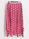 Cascading disc-fringe asymmetrical midi skirt