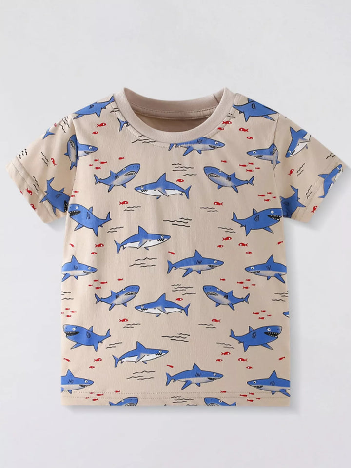 Tan children’s cotton tee with an all-over blue shark print.