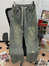Men's distressed wide-leg drawstring pants in light wash