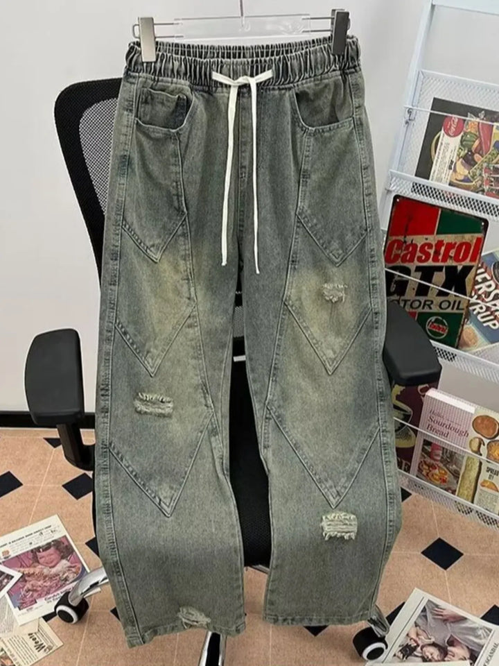 Men's distressed wide-leg drawstring pants in light wash
