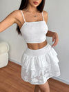 White smocked crop top and ruffle mini skirt set