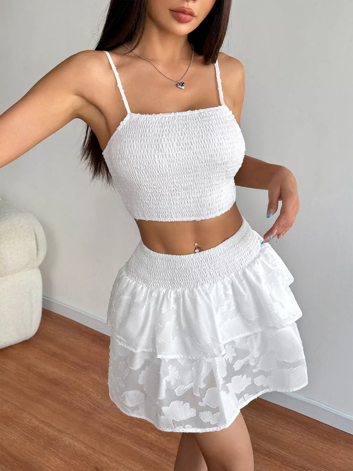 White smocked crop top and ruffle mini skirt set