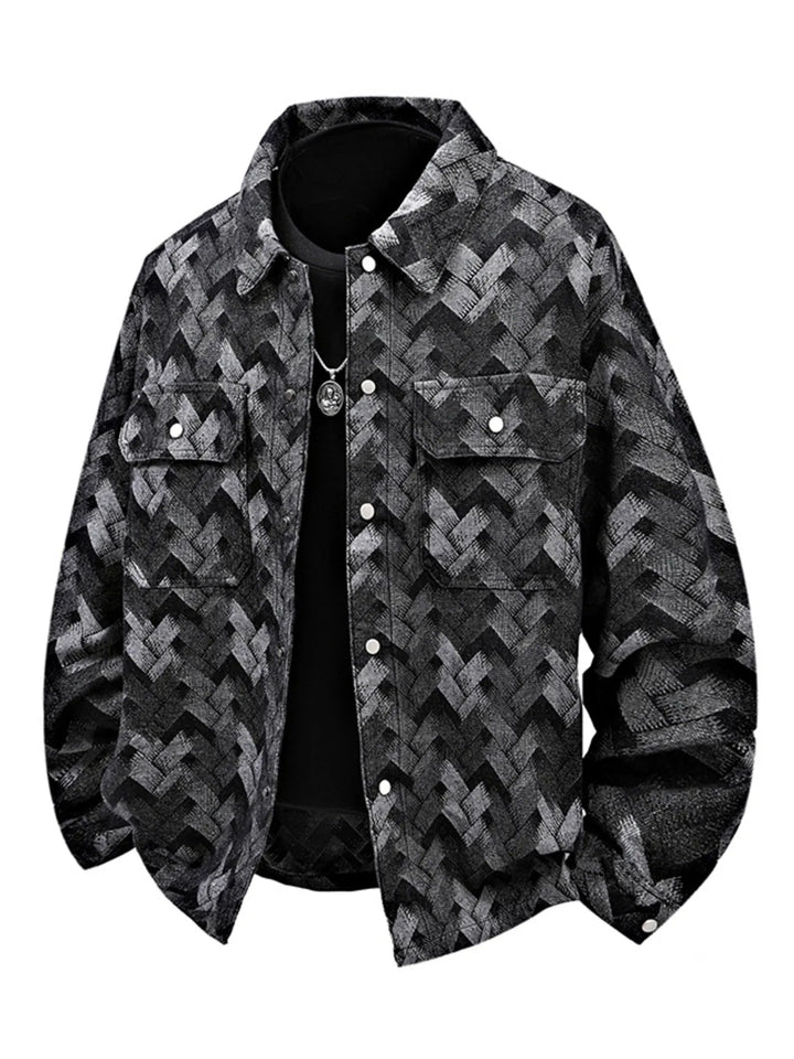Men’s geometric-patterned denim jacket in black.