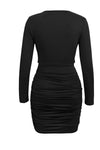 Black ruched cowl-neck long-sleeve mini dress, back view