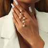 Gold-tone synthetic pearl bypass ring