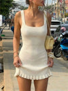 Apricot ribbed square-neck knit mini dress with ruffled hem.