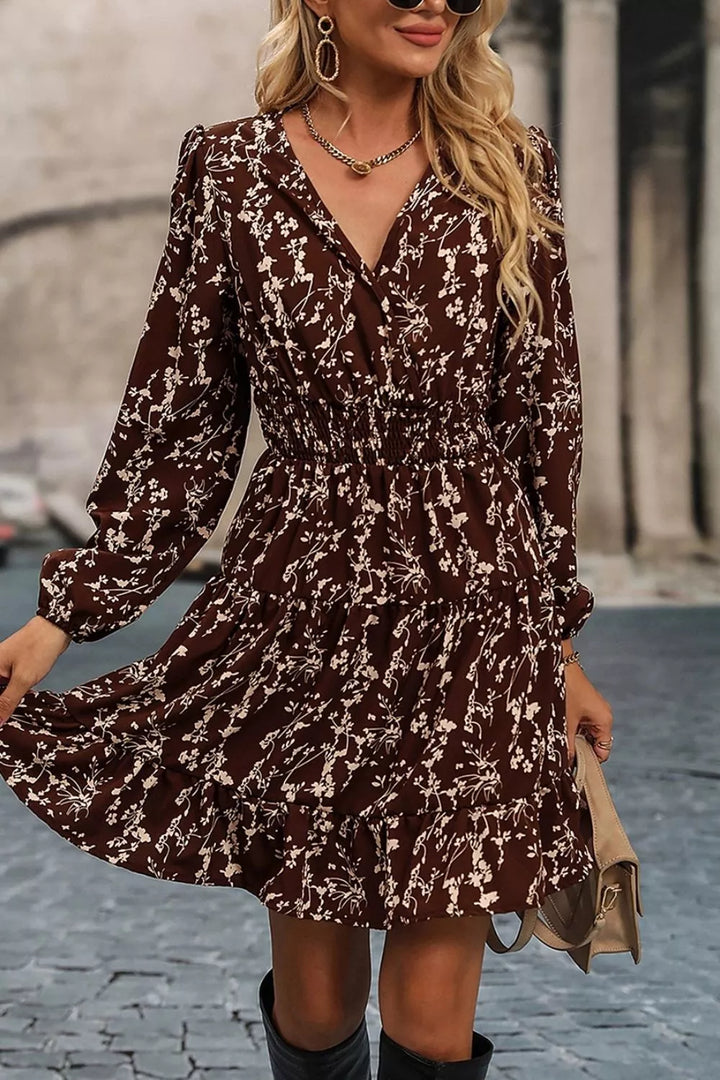 Coffee-brown floral long-sleeve mini dress with a shirred waist.