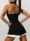 Black contrast-ruffle halter romper