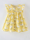 Light yellow peace-dove print children’s ruffle-sleeve dress.