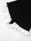 Black contrast-ruffle halter romper