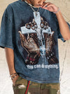 Model wearing the Carry the Cross vintage-wash tee in Washed Blue