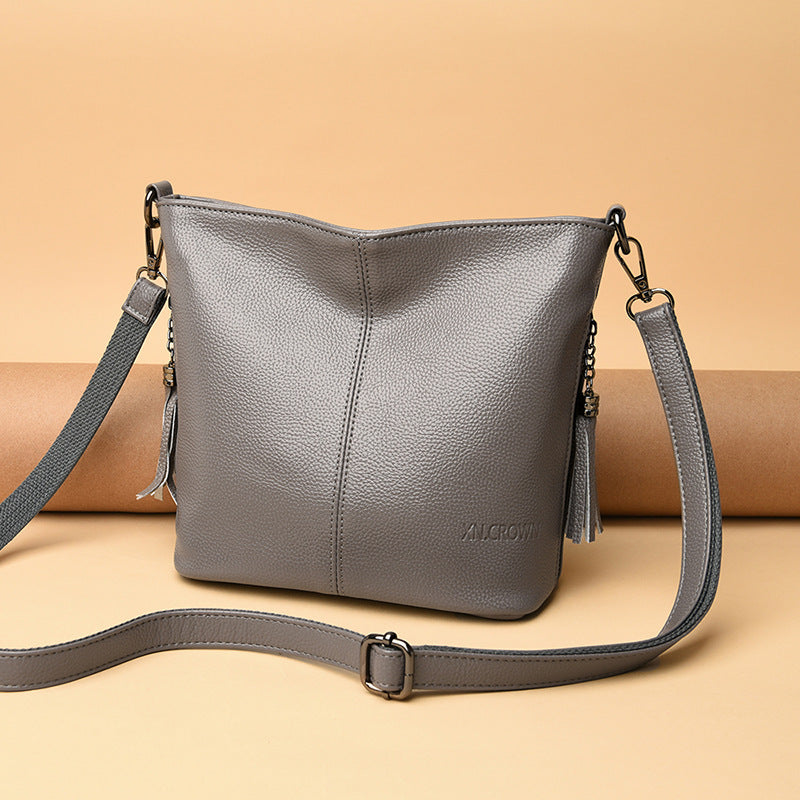 Women's High-Capacity Tassel Crossbody Bag – Leather Bucket Bag with Zipper Pocket