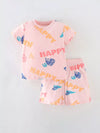 Blush pink happy-print children’s tee and shorts set.