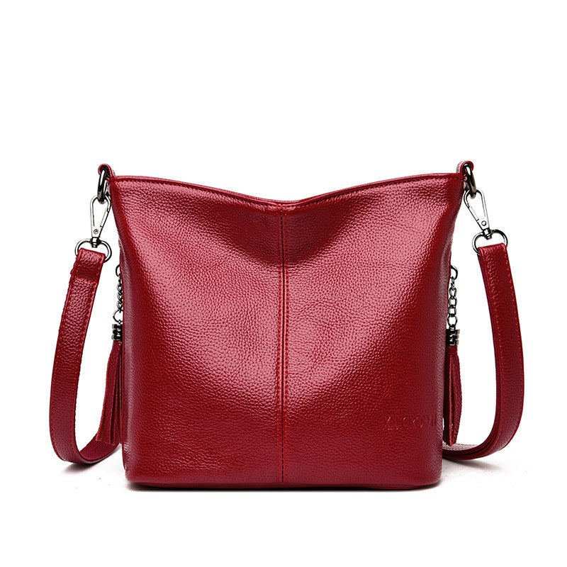 Women's High-Capacity Tassel Crossbody Bag – Leather Bucket Bag with Zipper Pocket