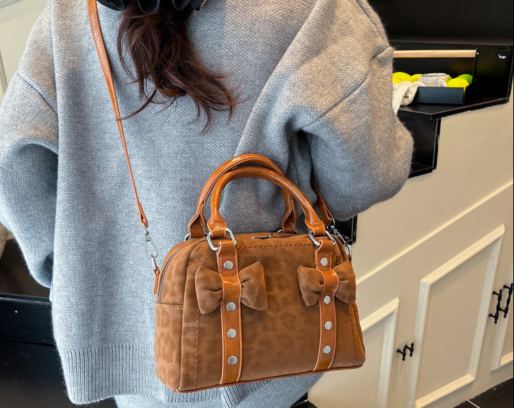 Women's PU Leather Pillow Bag – Crossbody & Handheld Purse with Rivet Detail