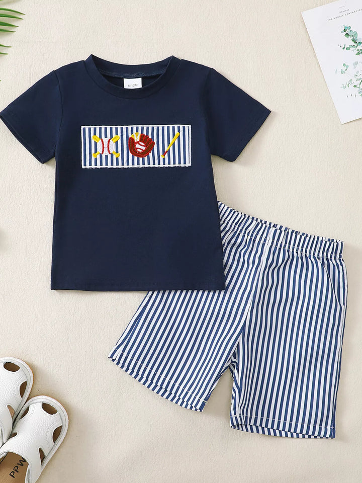 Blue children’s embroidered T-shirt with striped shorts.